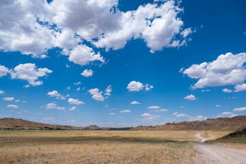 Steppe landscape in the Ili River valley near Almaty, with a beautiful sky in the clouds