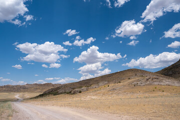 Steppe landscape in the Ili River valley near Almaty, with a beautiful sky in the clouds
