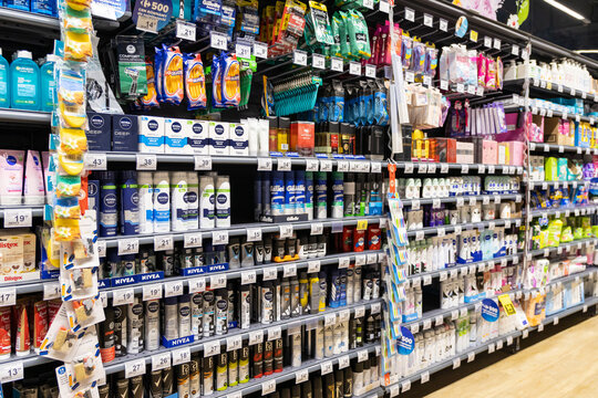 Poznan, Poland - June 26, 2025: Supermarket shelves brimming with diverse Nivea and Gillette personal care items, showcasing modern retail, vast consumer choice and essential daily goods