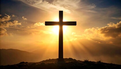 Silhouette cross at sunset