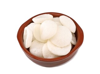Classic chinese prawn crackers in an earthenware bowl on white background