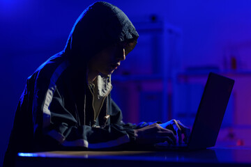 Hacker cyberattack representing data breach and cybersecurity threat in digital system