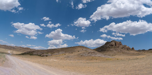 Steppe landscape in the Ili River valley near Almaty, with a beautiful sky in the clouds