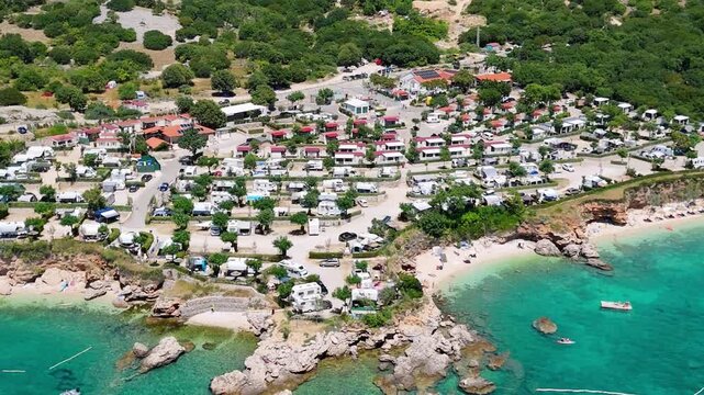 Campsite at Campig Skrila, Krk Island, Stara Baska Croatia, Aerial View of the Mountains and Coast With Boats, Beaches and Adriatic Sea.  The Seaside Rv Campmobiles on a Summer Beautiful Coastline