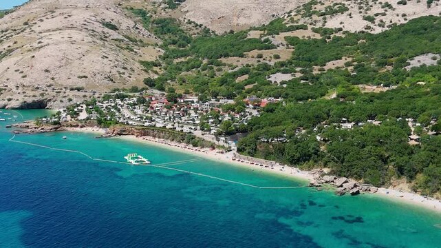 Campsite at Campig Skrila, Krk Island, Stara Baska Croatia, Aerial View of the Mountains and Coast With Boats, Beaches and Adriatic Sea.  The Seaside Rv Campmobiles on a Summer Beautiful Coastline