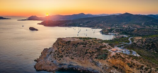 Panoramic aerial view of the bay at Cape Sounion, Greece, with the famous Temple of Poseidon, the...