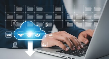 Person using laptop with cloud computing interface and folder icons displayed above the screen
