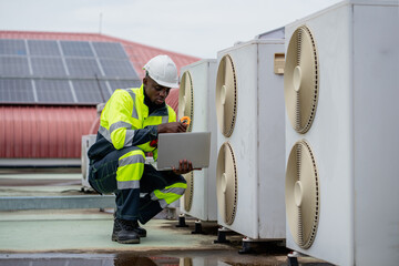 Engineers is checking the air conditioning cooling system of a major building or industrial...