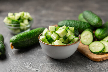 Cucumber on wooden background. Slice of cucumber on background. Fresh organic green cucumbers...