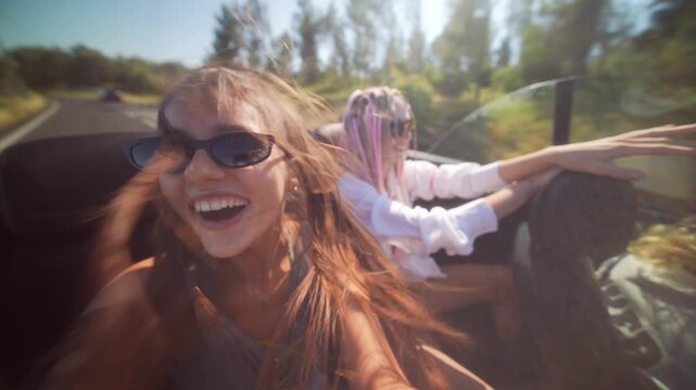Joyride Friends Sharing a Wonderful and FunFilled Drive in a Stylish Convertible Car