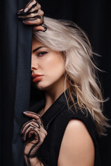Platinum Blonde Woman with Artistic Black Paint