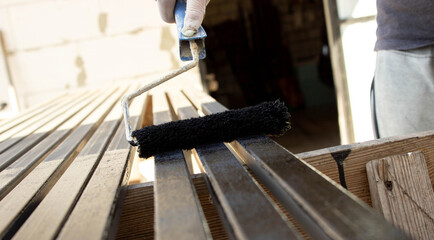 Painting Metal Surface with Paint Roller