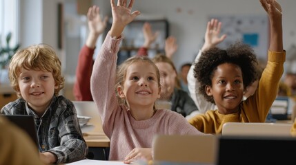 Fototapeta premium Happy diligent smiling multiethnic diverse schoolchildren having lesson at elementary stem class sitting at desks using gadgets. Schoolkids raising hands answering to questions at workplace., no logo