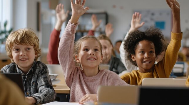 Happy diligent smiling multiethnic diverse schoolchildren having lesson at elementary stem class sitting at desks using gadgets. Schoolkids raising hands answering to questions at workplace., no logo