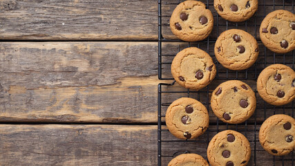 Pile of Warm Chocolate  Cookies on Wire Cooling Rack with Melted Chips

