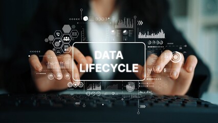Professional Businesswoman Managing Data Lifecycle Integration in Modern Office Environment with...