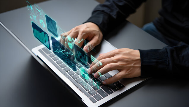 A person types on a laptop with vibrant data visualizations, showcasing modern technology and connectivity in a digital age.