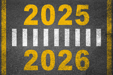 New year 2026 or straight forward concept. Text 2025, 2026, 2027, 2028 written on the road in the...