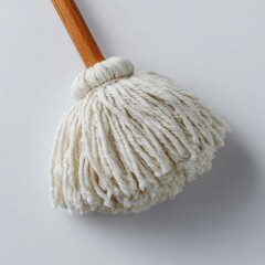 A plain white mop head, isolated on a pure white background. Cleaning, household tool.