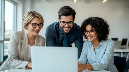 Laptop, collaboration and business people in the office while working on a company project. Technology, joyful group of three diverse professionals gathered around a laptop in a bright, modern office