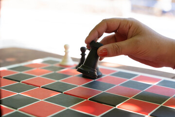 Close-Up of a Chess Game in Progress: Black's Turn to Move the Rook