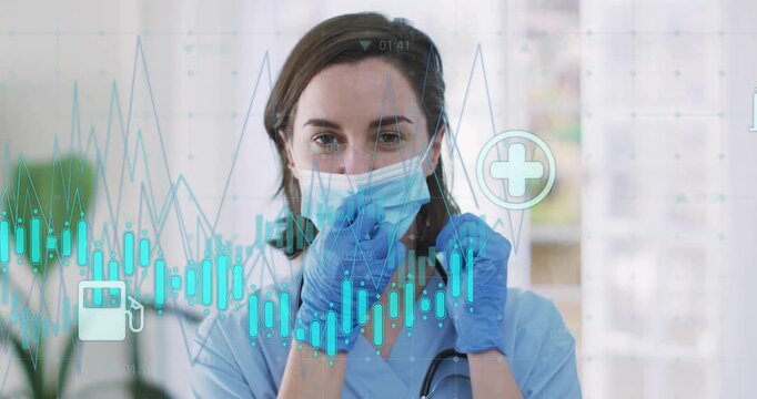 Healthcare professional unhooking mask as health analytics icons animating, revealing smiling face