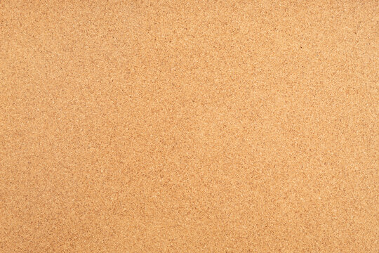macro photography of a yellow brown cork board texture