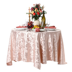 Elegant round dining table decorated with a beautiful floral centerpiece arranged with colorful flowers and greenery, set for a formal dinner with pink napkins and glassware