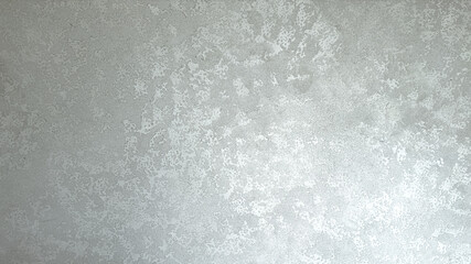 Decorative silver venetian plaster wall background, smooth metallic texture with soft shine, seamless luxury stucco surface for architecture, art and highend interior design.