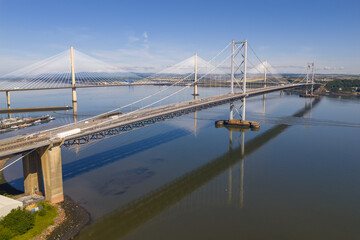 Obraz premium Aerial image of the Forth Road Bridge and Queensferry bridge in Edinburgh - Scotland. 