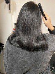Fototapeta premium hairdresser with long hair