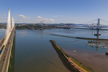Aerial image of Queensferry Crossing, Forth Road Bridge and Forth Railway Bridge in Edinburgh -...