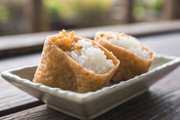 a delicate serving of inari sushi