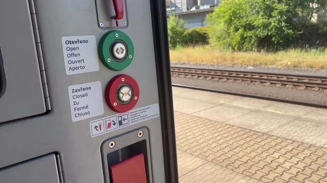 lever and buttons at the train exit