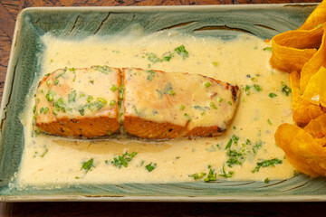 Grilled Salmon in Coconut Sauce with Plantain Chips