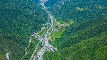 Scenic aerial view of Ciclovia Alpe Adria through Pietratagliata and gorge, Italy – bridges,...