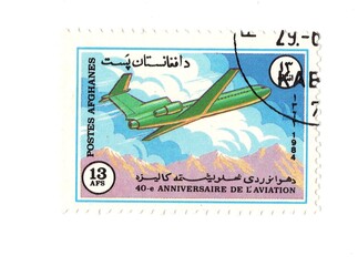 A vintage postage stamp from Afghanistan isolated on a white background.
