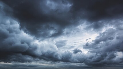 Obraz premium The Dramatic Scene of Dark Clouds Over an Expansive Sky