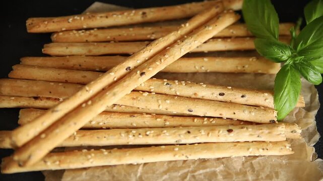 Grissini breadsticks whole grain cereal fresh delicious gourmet food background on the table rustic food top view copy space