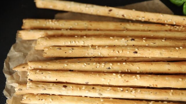 Grissini breadsticks whole grain cereal fresh delicious gourmet food background on the table rustic food top view copy space