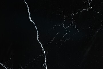 Texture of black marble surface as background, top view