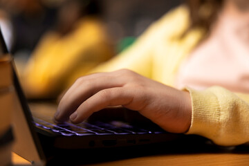 Scholar pupil preparing for a theoretical lecture by taking notes on pc, reading literature...