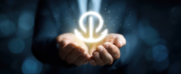 The glowing symbol of potential held in professional hands