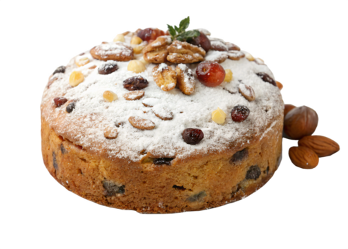 homemade christmas cake with raisins, nuts and icing sugar, isolated PNG transparent background