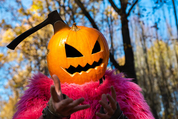 Axe in pumpkin