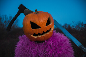 Axe in pumpkin