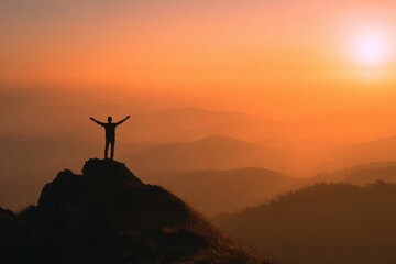 Silhouette of male on the mountain with open arms - Successful hiker exult on the top of the rock - Leadership concept