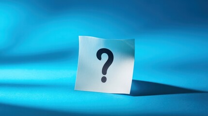 The question mark on a sticky note against a vibrant blue background.