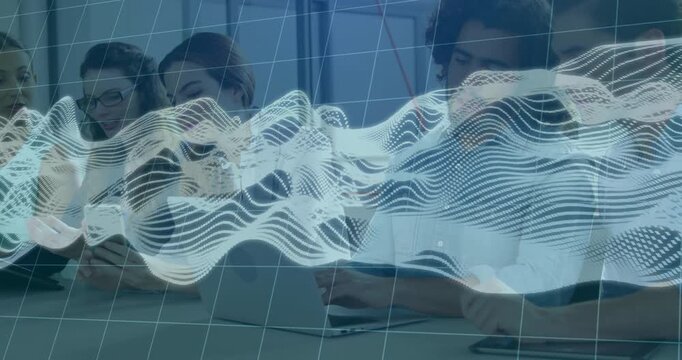 Colleagues opening laptops placing phones in tech office driving data wave overlay guiding chart
