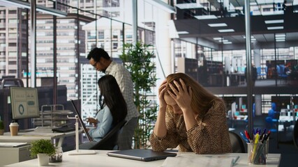 Entrepreneur feels emotional strain and frustration of business failure, disappointment and...